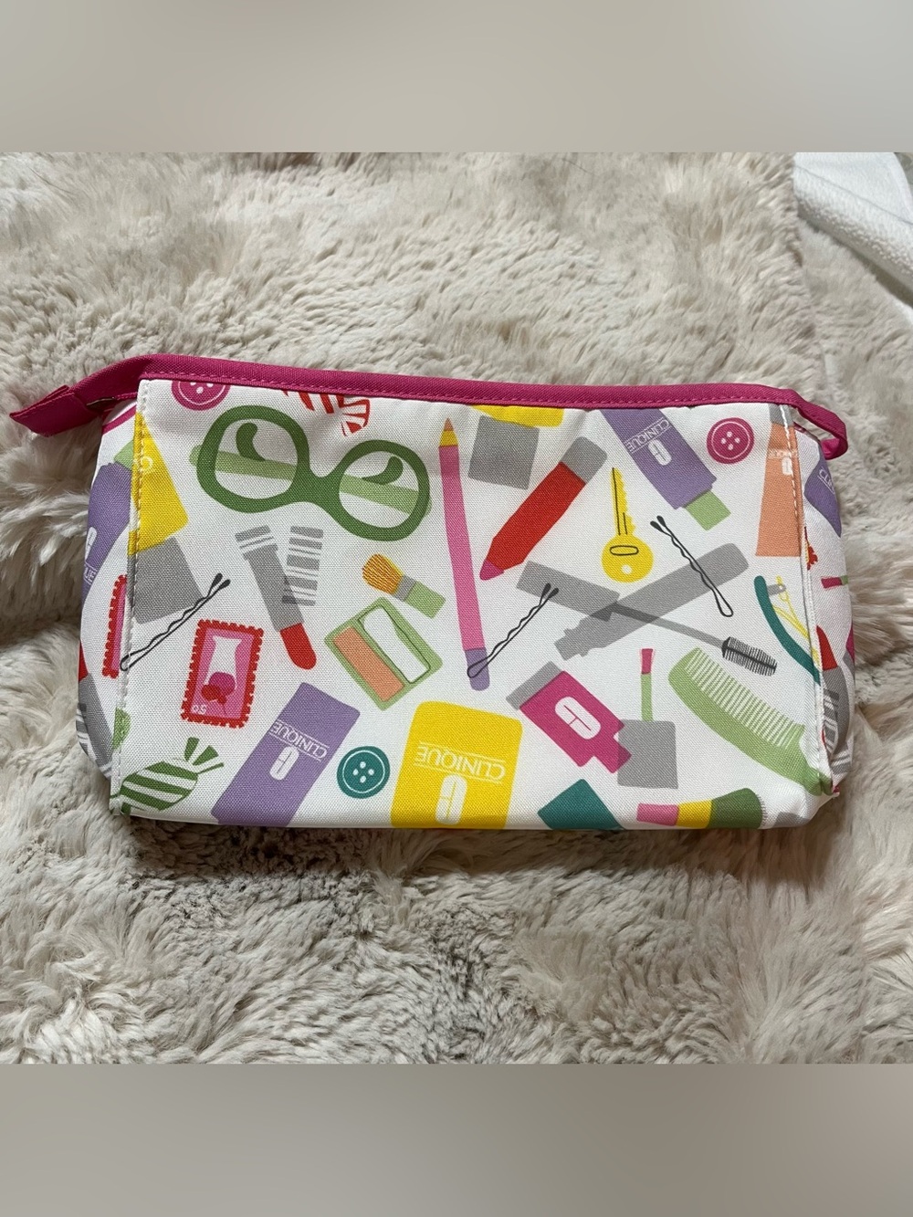 Clinique White with Pink Trim and Multicolor Print
02-20